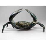A cast bronze crab - claws raised, width 15cm.