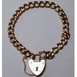 A 9ct yellow gold belcher link bracelet - with a 9ct yellow gold heart shaped padlock, weight 16.