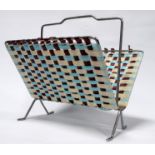 A 1960's chrome and woven 'Raffia' magazine rack - of folding design with a central handle, width
