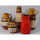 A West German 1970s brown glazed vase - together with three further vases from the same range and