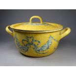 A casserole decorated by Cynthia Greenslade of Portscatho - with twin handles and lid, yellow