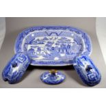 A late 19th century blue and white willow pattern ashette - oval, width 44cm, together with three