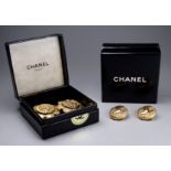 A pair of vintage Chanel ear clips - the classic double 'C' logo on a circular woven ground,