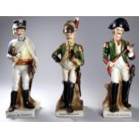 A 20th century figure of a French cavalry officer - standing in uniform, height 21cm, together