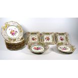 A 19th century continental porcelain fruit service - of reticulated design and finely decorated with