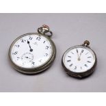 An Omega open face pocket watch - in a base metal case, the white enamel dial set out in Arabic