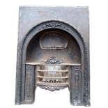 A Victorian rectangular cast iron fireplace - incorporating a fire basket within a foliate arched