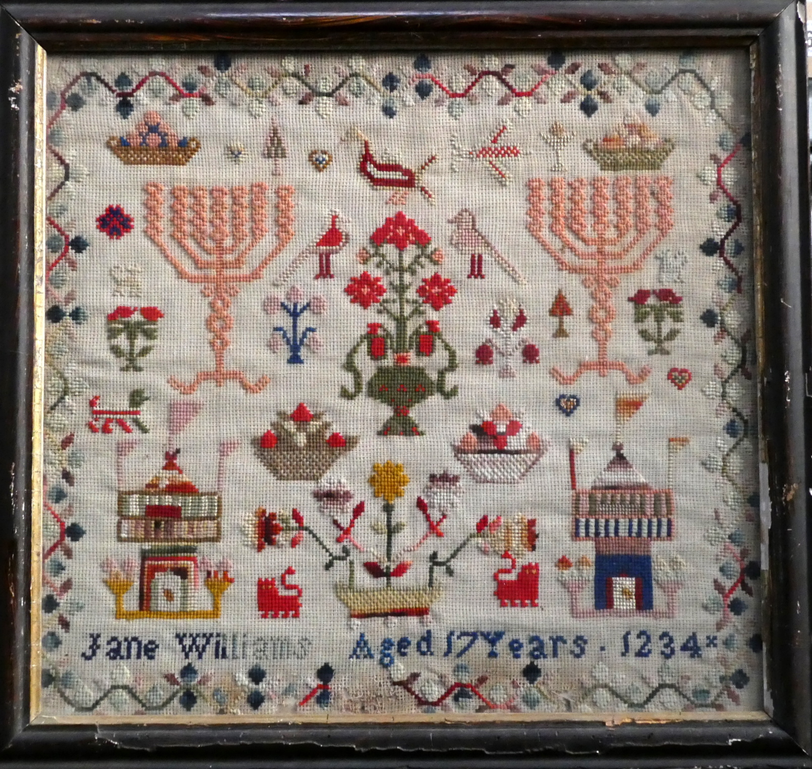 A William IV needlework sampler - showing flowers and birds, Jane Williams Aged 17 Years 1834,