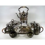 A Victorian silver plated spirit kettle - of oval form with stop fluting and raised on cabriole