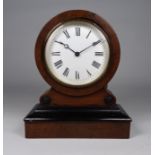 A late 19th century mahogany cased mantel time piece - the white enamel dial set out in Roman