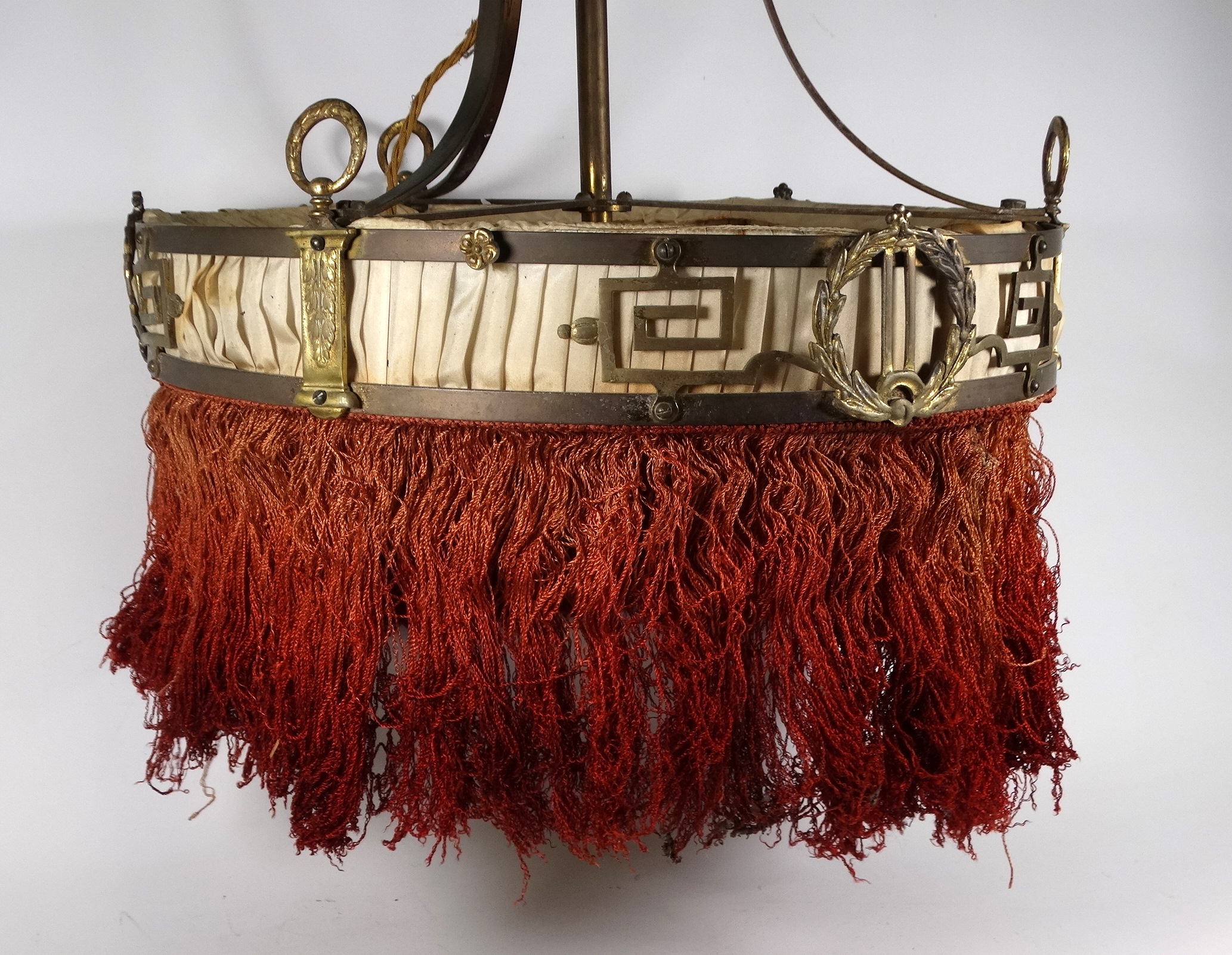 An early 20th century brass ceiling light - the ring with classical motifs and with ruche cream silk - Image 2 of 3