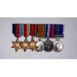 A WWII and later medal group - comprising the 1939-45 Star, Africa Star, Burma Star, Defence