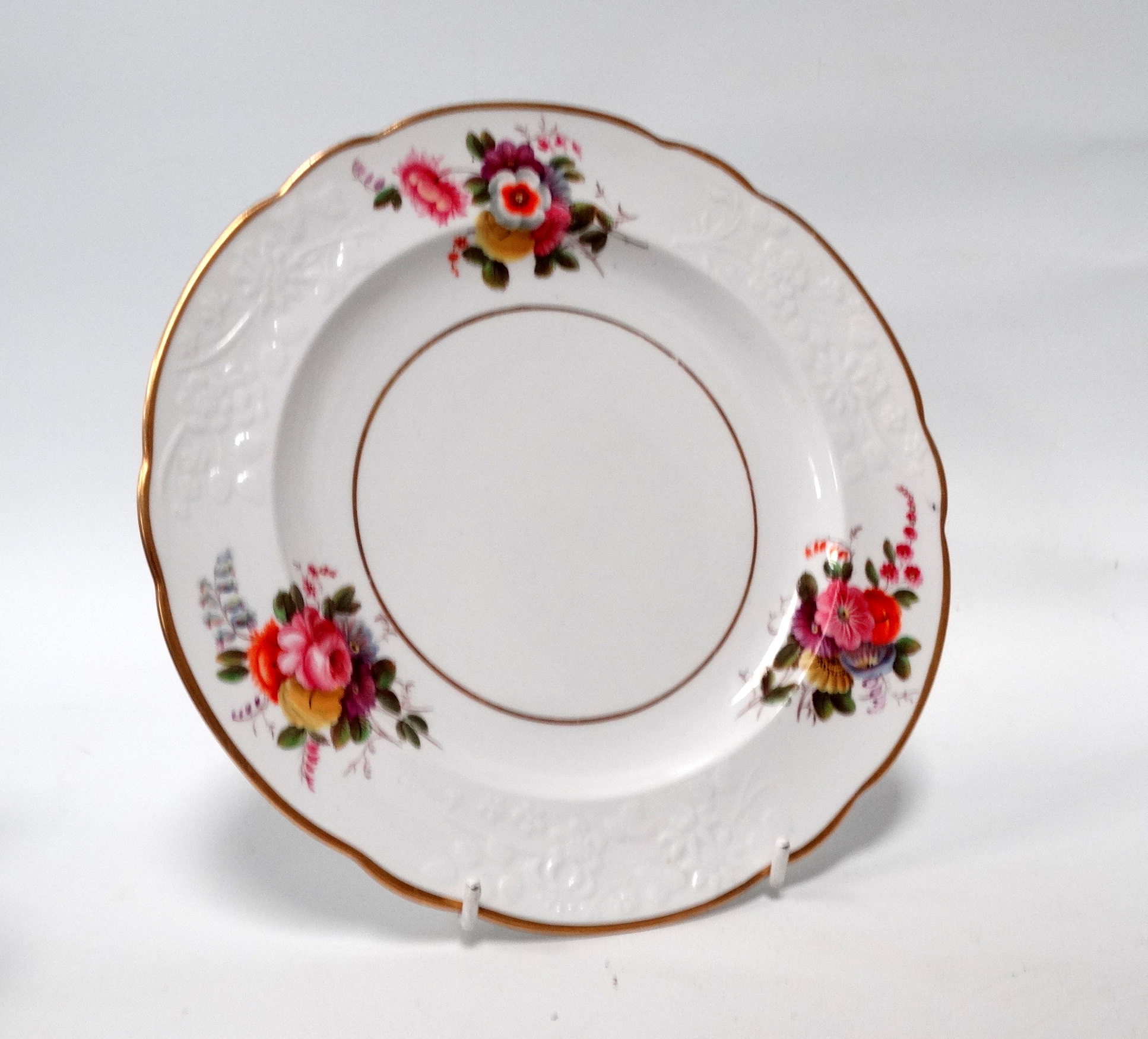 A Royal Crown Derby cabinet plate - decorated with floral vignettes on a dark blue ground with - Image 3 of 7