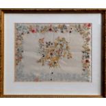 A Georgian silk embroidered panel - decorated with flowers, framed and glazed, 37 x 43cm.