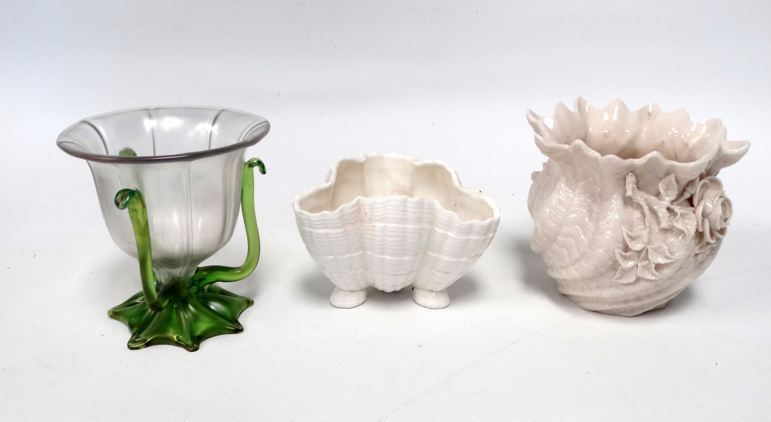 A Belleek fern pot - moulded decoration with flowers, stamped to base, height 11cm, together with