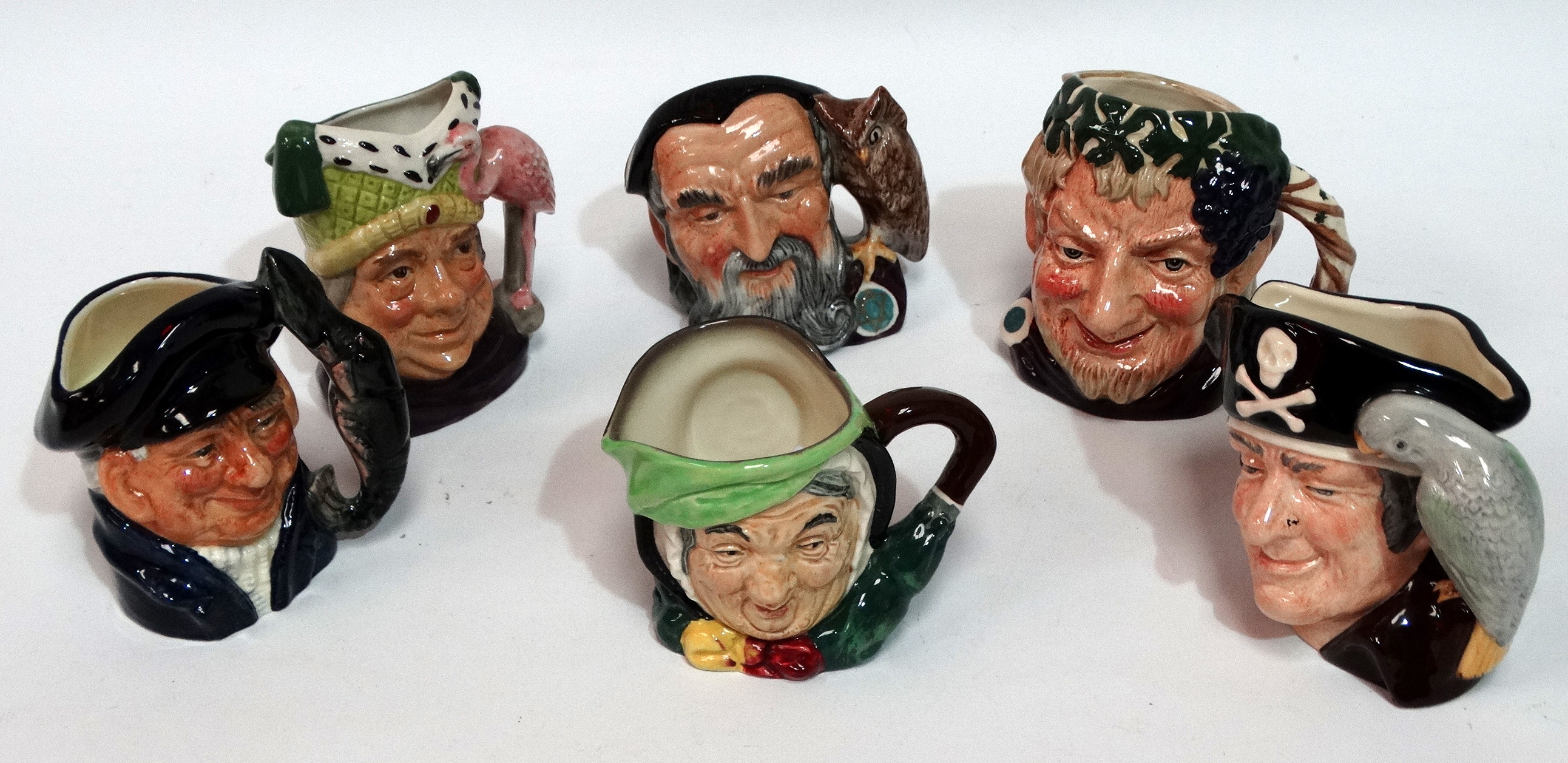 A small Royal Doulton character jug - Ugly Duchess, height 10cm, together with Bacchus, Lobster Man,