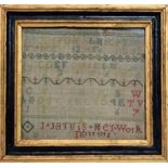 An 18th century needlework sampler - alphabet and numbers in various colours, dated 1792, framed and