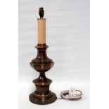 A brass table lamp - of octagonal baluster form, height 70cm.