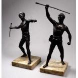After the antique, a pair of late 19th century spelter castings of Greek atheletes holding