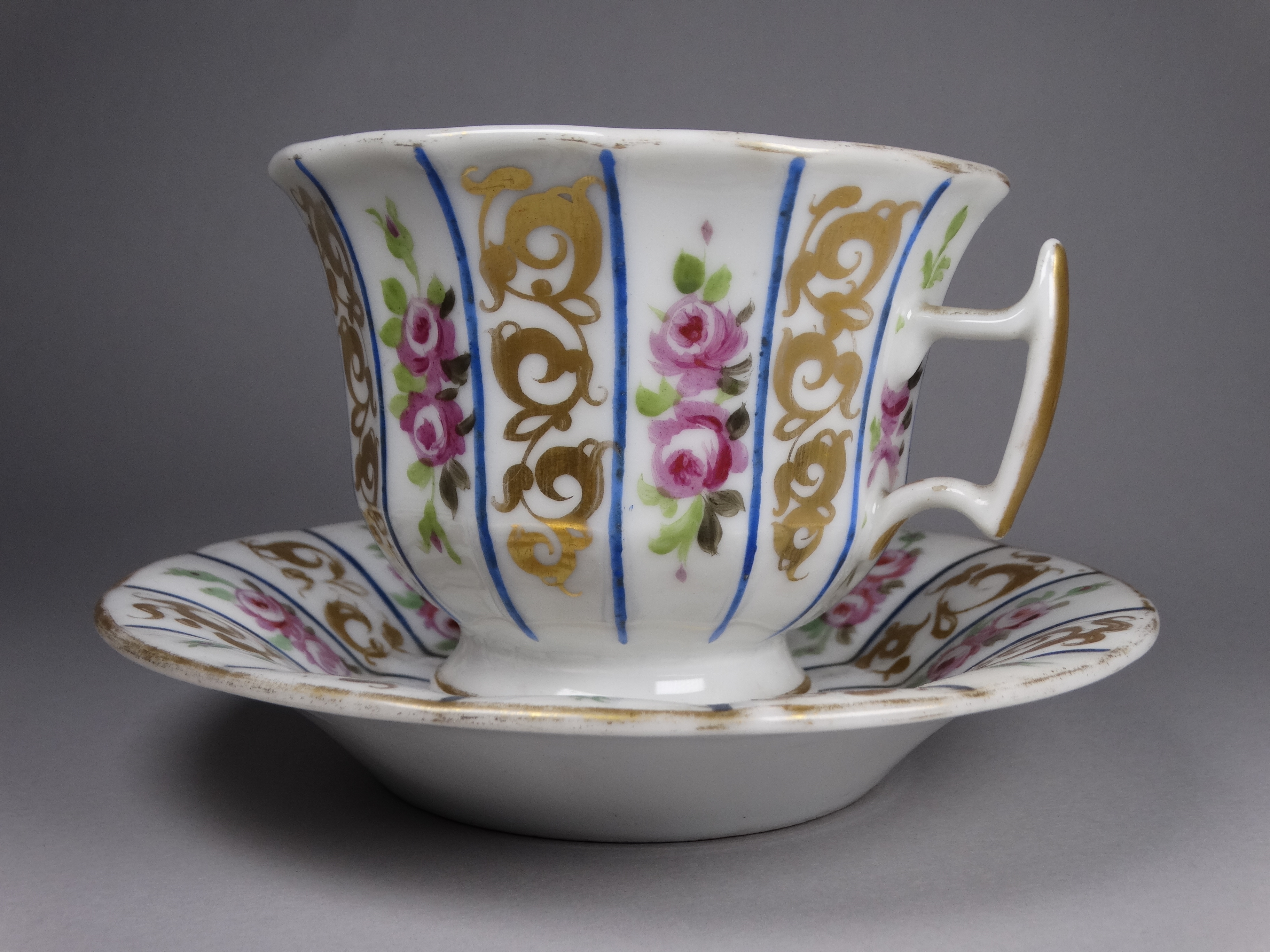 A late 19th century continental cup and saucer - of an exaggerated size and decorated with panels of - Image 3 of 4