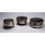 A silver pique work box - the tortoiseshell lid set with floral garlands, of circular form and
