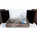 A vintage Toshiba stereo system - model SM3150 with faux rosewood and brushed aluminium finish,