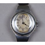 An early 20th century silver cased wristwatch - import mark for London 1913, the silvered dial set