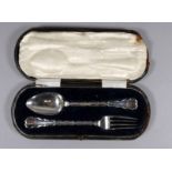 A silver christening fork and spoon - Sheffield 1916, sponsor's mark for Lee & Wigfull, cased,