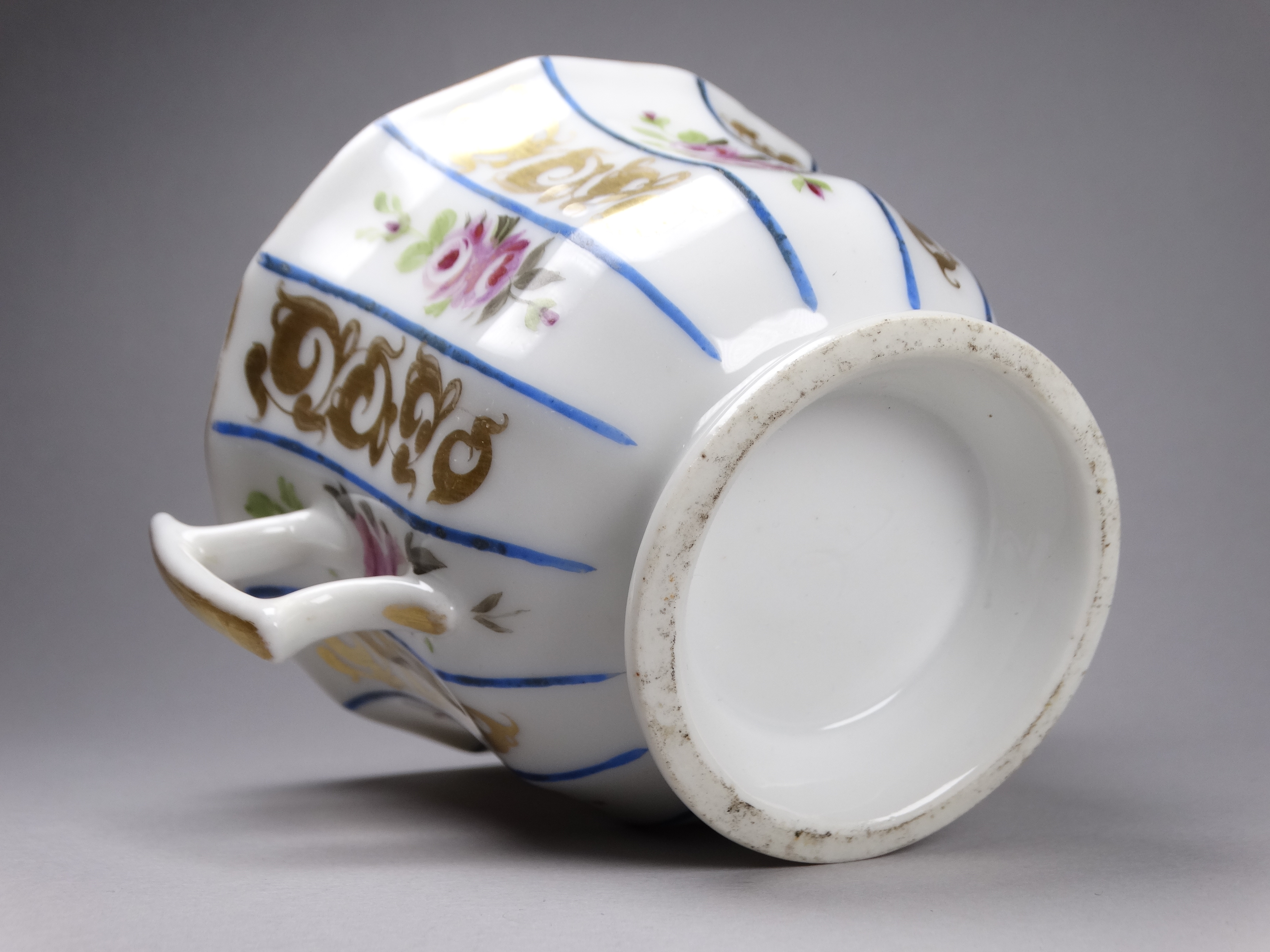 A late 19th century continental cup and saucer - of an exaggerated size and decorated with panels of - Image 4 of 4