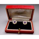 A pair of 9ct yellow gold amethyst and pearl ear clips - of floral pattern, weight 4.6g.