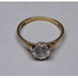 A 9ct yellow gold solitaire ring - set with cubic zirconia, size Q, weight 2.4g.