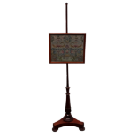 A William IV mahogany face screen - with a rectangular embroidered panel dated 1952, on a