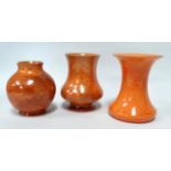 A Pilkington's Lancastrian Pottery trumpet shaped vase - of speckled orange glaze, impressed marks