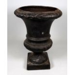 A late 19th century cast iron campana shaped urn - height 32cm.