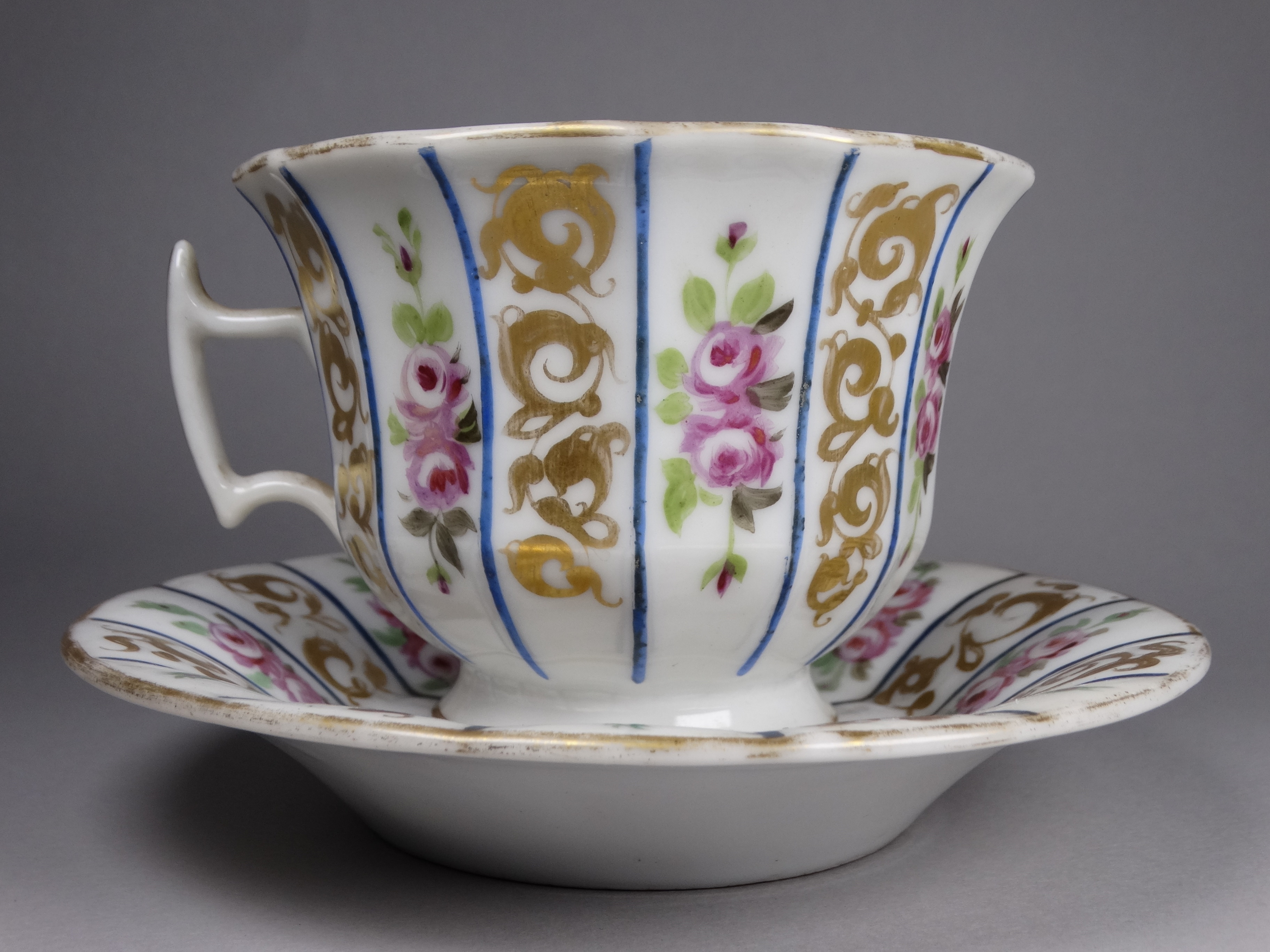 A late 19th century continental cup and saucer - of an exaggerated size and decorated with panels of - Image 2 of 4
