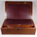 A mid Victorian mahogany writing slope - of rectangular form with a red leather writing surface,