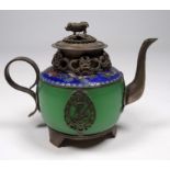 An oriental white metal teapot - the cover mounted with a pig above a cloisonne band, height 10cm.