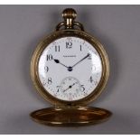 An early 20th century Waltham full hunter pocket watch - the white enamel dial set out in Arabic