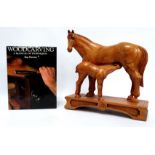 Reg PARSONS (British 20th Century) Mare and foal - carved hardwood, the pair standing on a plinth