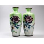 A pair of Japanese ginbari vases - decorated with peonies on a graduated green ground, height 12cm.