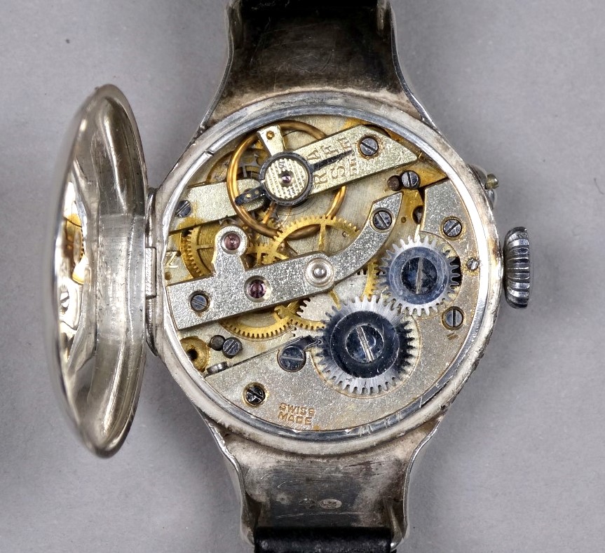 An early 20th century silver cased wristwatch - import mark for London 1913, the silvered dial set - Image 3 of 3