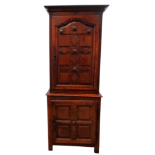 A late 18th century French chestnut cupboard - the moulded cornice above a geometric panel door, the