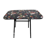 A vintage drop leaf kitchen table - the melamine top decorated with vegetables and fruit, on a