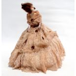 An early 20th century continental doll - with bisque body and arms, stamped FPK, wearing a lace