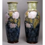 A pair of Lambeth Doulton vases - baluster shaped and tube-line decorated with chrysanthemums,