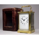An early 20th century carriage timepiece - Jenner & Knewstub London, with a corniche case with