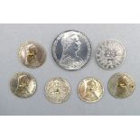 An Austrian Maria Theresa thaler - together with five one thaler silver coins now as buttons with