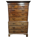 A George III mahogany chest on chest - the moulded dentil cornice above an arrangement of two
