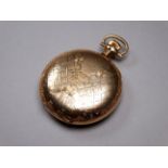 An Elgin full hunter gold plated pocket watch - the engraved case decorated with foliage and