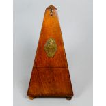 An early 20th century mahogany cased metronome - of typical square tapering form, height 22cm.